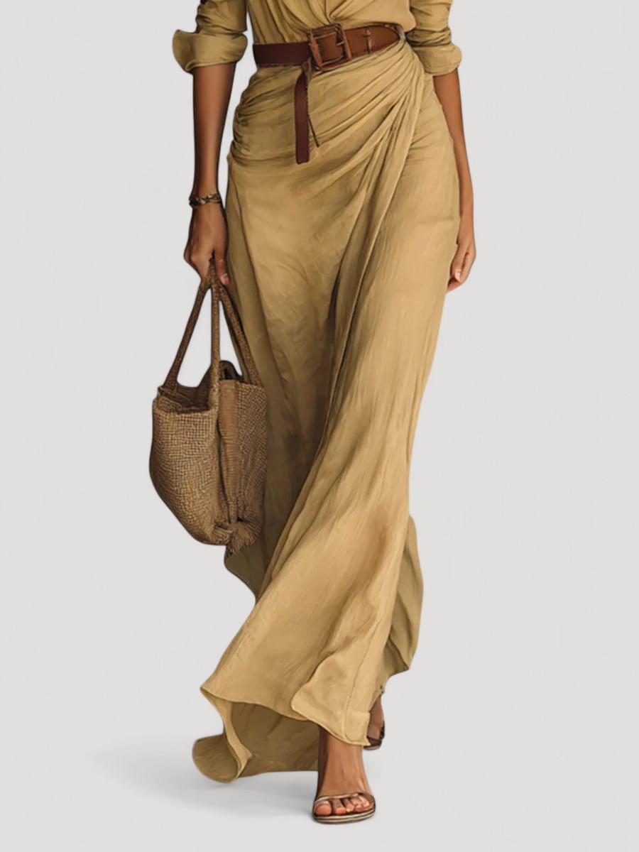 Pitkä vyöllinen mekko