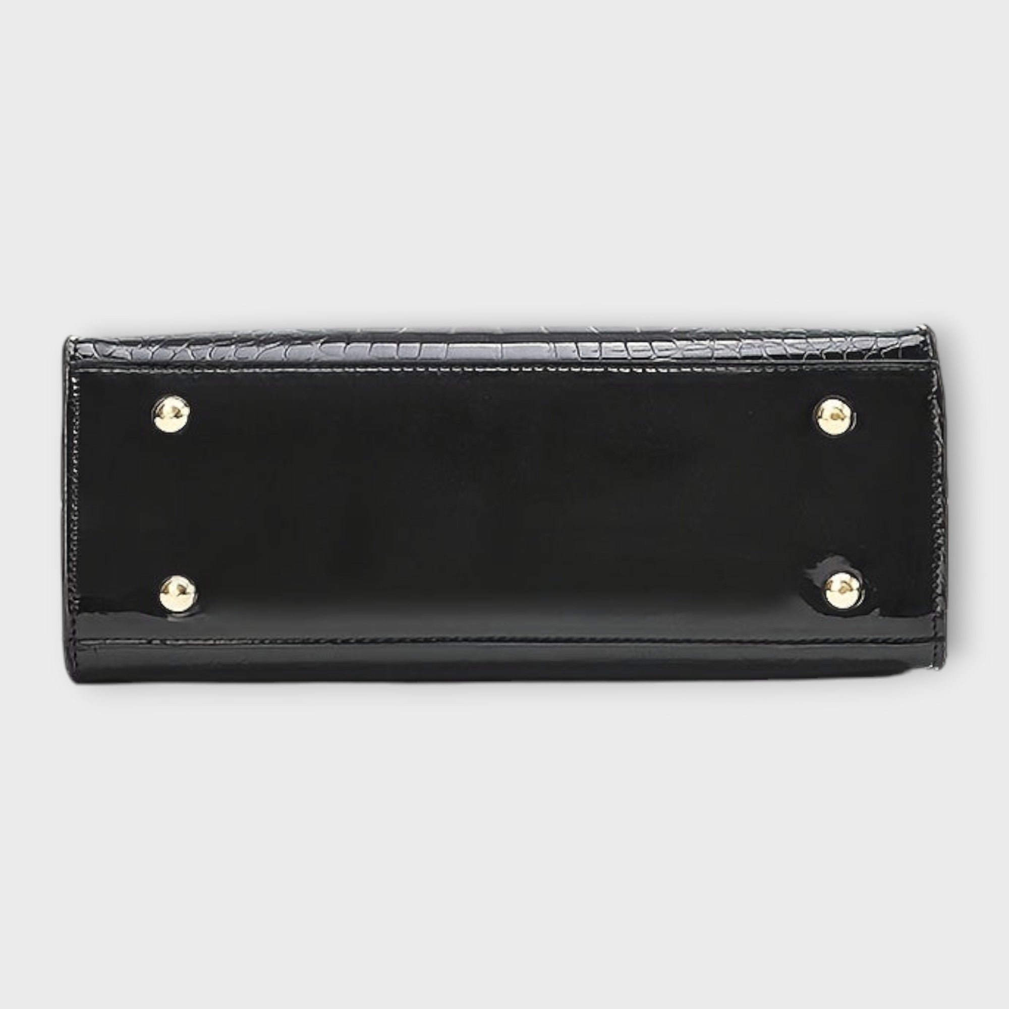 Kiiltävä krokokuosinen käsilaukku